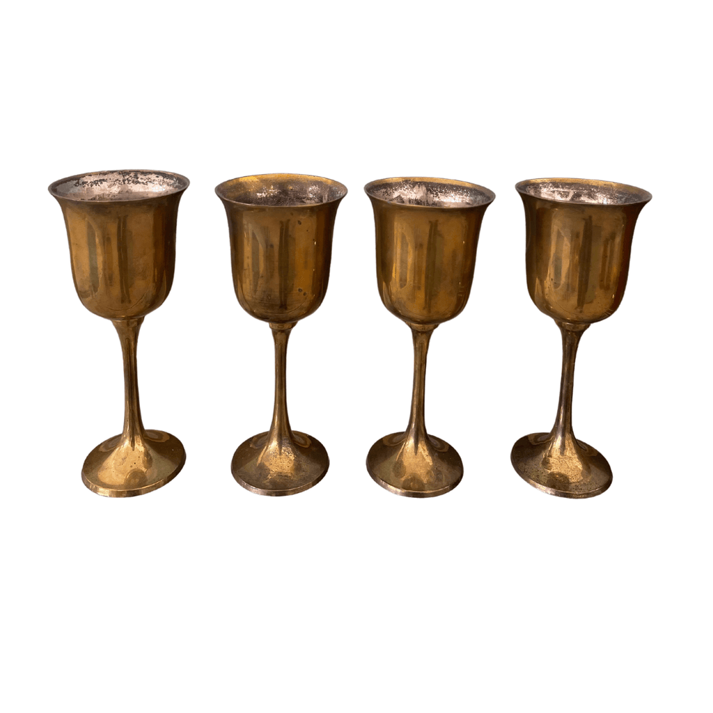 https://nobledesigns.com/cdn/shop/files/brass-wine-goblets-noble-designs_1024x1024.png?v=1704666462